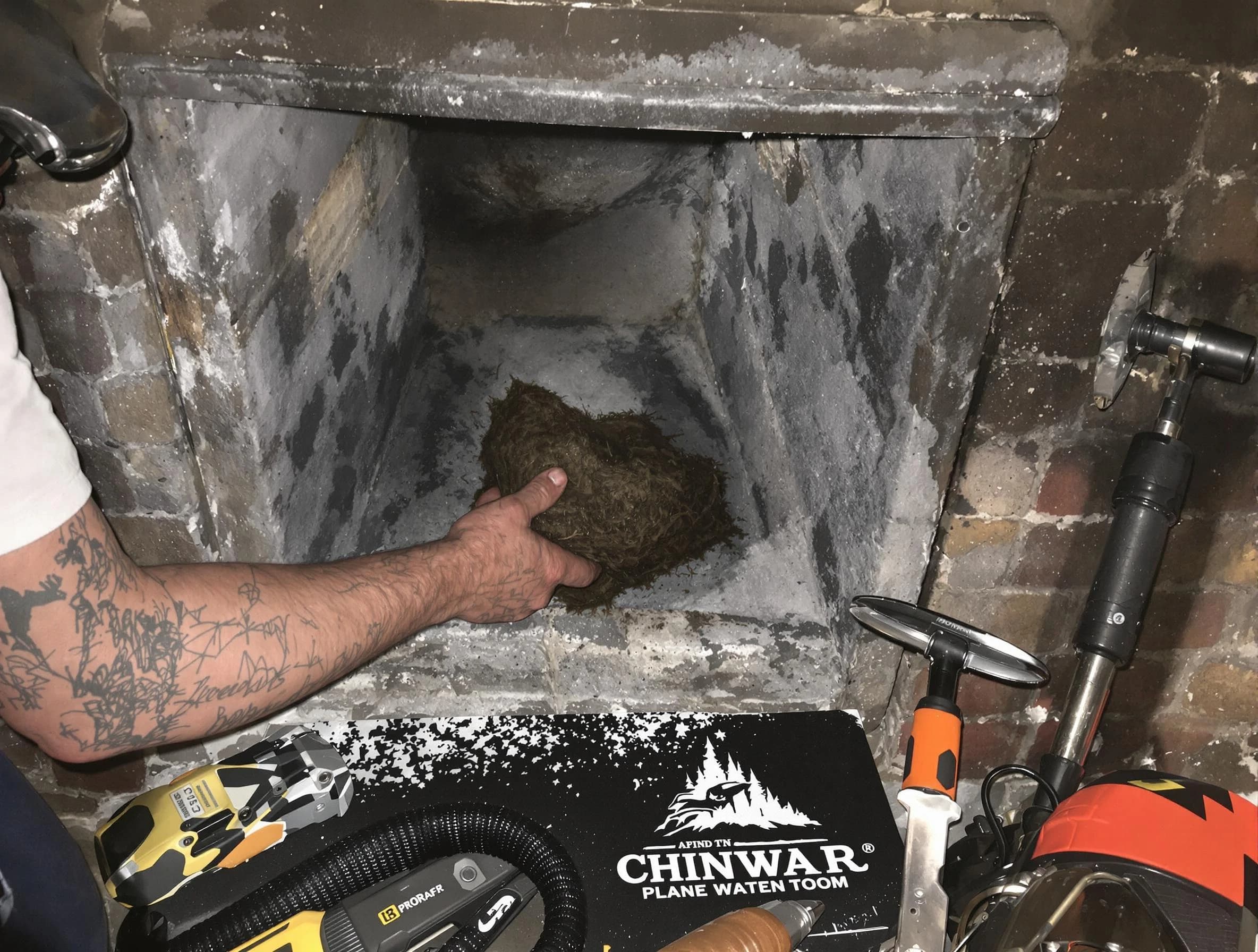 Kaysville Chimney Sweep safely removing debris and screening chimney in Kaysville, UT