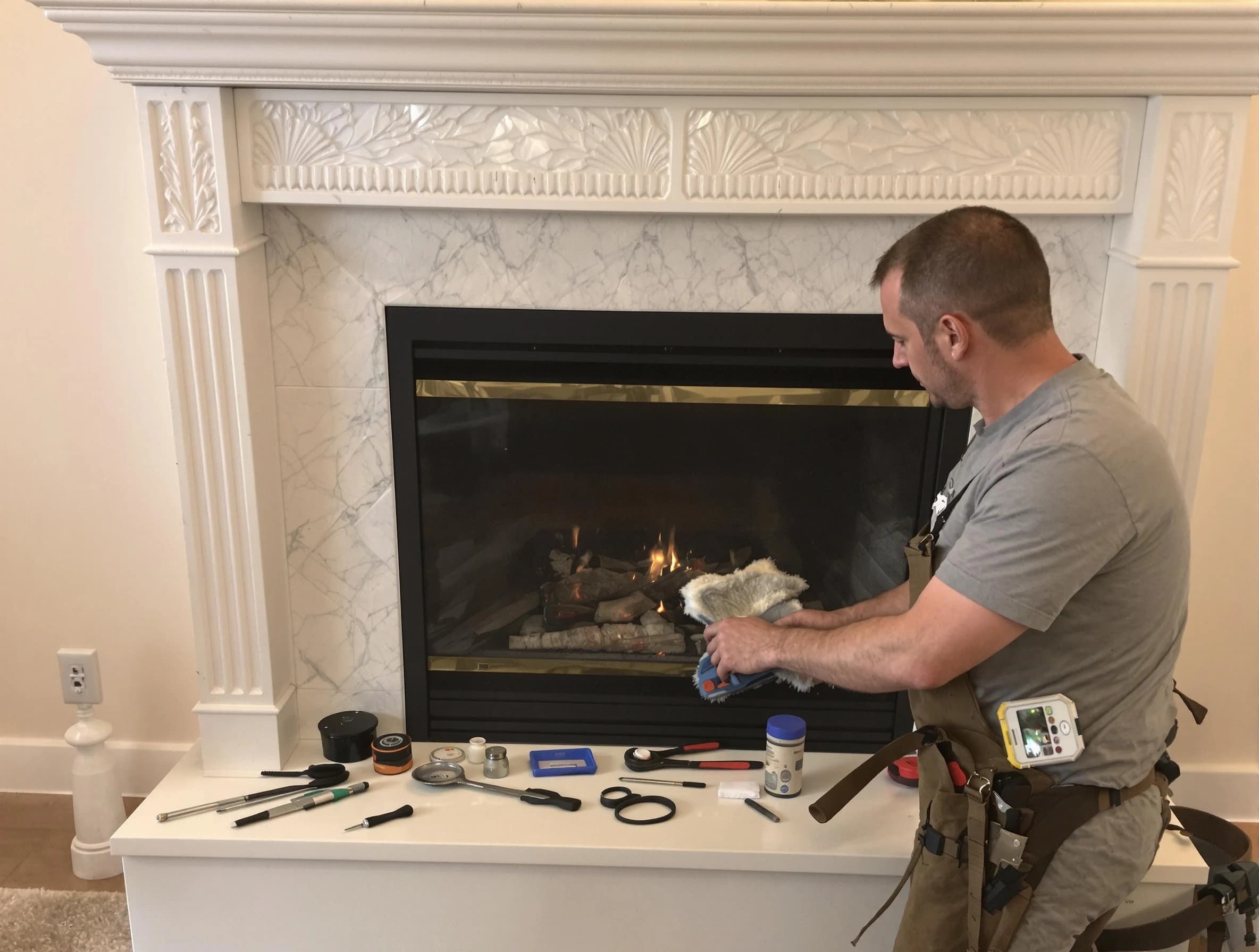 Kaysville Chimney Sweep performing fireplace maintenance in Kaysville, UT